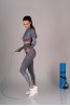 Женский облегающий спортивный комплект из леггинсов и топа с длинным рукавом Merribel 847 gym gray 1757 - фото 3
